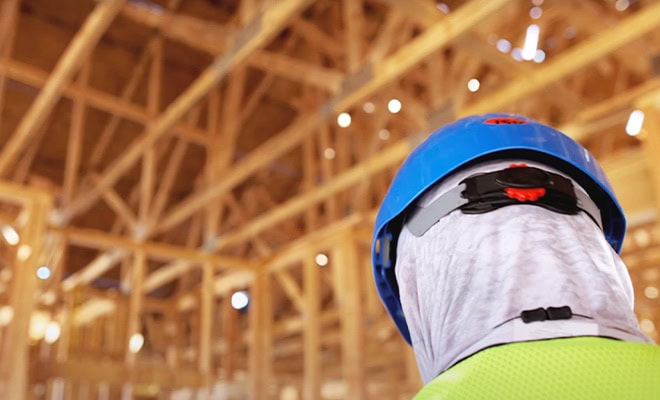 Construction Worker Inside Framed Home Building Process