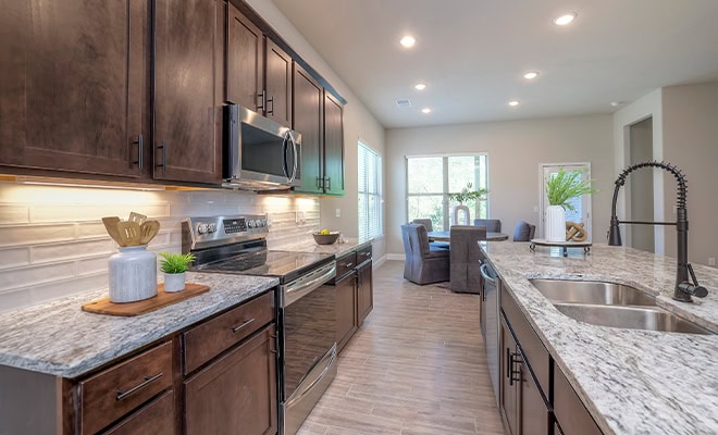Kitchen Dark Cabinets Stainless Appliances Island Sink
